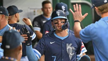 Jun 28, 2024; Kansas City, Missouri, USA;  Kansas City Royals shortstop Bobby Witt Jr. (7) celebrates in the dugout after scoring a run in the third inning against the Cleveland Guardians at Kauffman Stadium. Mandatory Credit: Peter Aiken-USA TODAY Sports