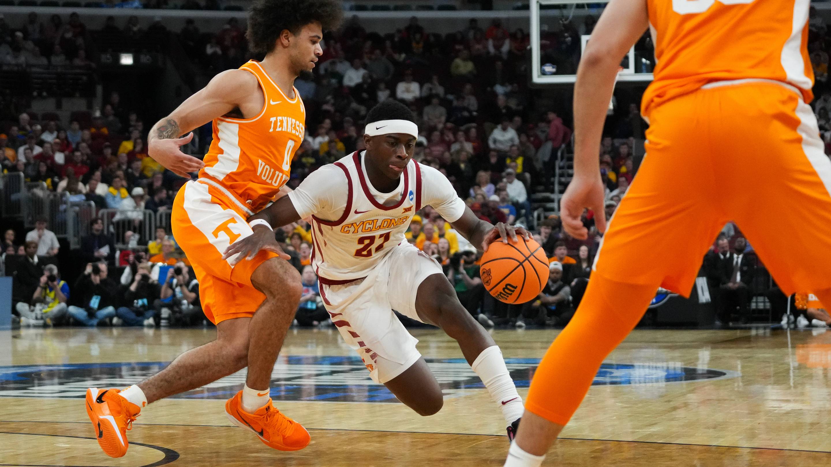 Mar 27, 2026; Chicago, IL, USA; Iowa State Cyclones guard Killyan Toure (27) drives the ball against Tennessee Volunteers guard Ja'Kobi Gillespie (0) in the second half during a Sweet Sixteen game of the Midwest Regional of the men's 2026 NCAA Tournament at United Center. Mandatory Credit: David Ban
