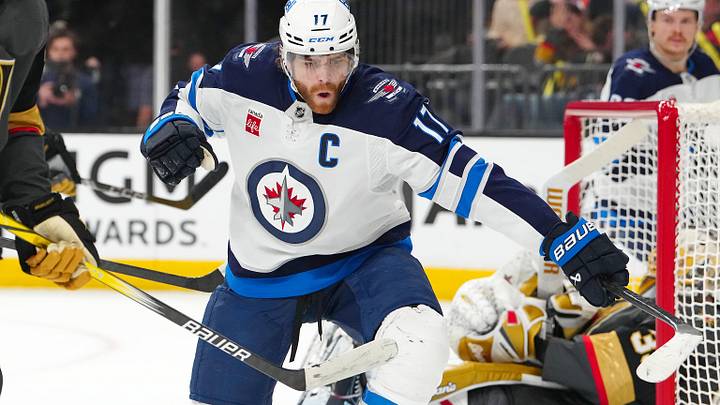 Apr 3, 2025; Las Vegas, Nevada, USA; Winnipeg Jets center Adam Lowry (17) celebrates after scoring a goal against the Vegas Golden Knights during the first period at T-Mobile Arena. Mandatory Credit: Stephen R. Sylvanie-Imagn Images