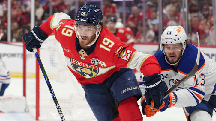Florida Panthers forward Matthew Tkachuk skates away from Edmonton Oilers forward Mattias Janmark. Florida Panthers forward Matthew Tkachuk skates away from Edmonton Oilers forward Mattias Janmark.