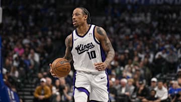 Feb 10, 2025; Dallas, Texas, USA; Sacramento Kings forward DeMar DeRozan (10) brings the ball up court against the Dallas Mavericks during the second half at the American Airlines Center. Mandatory Credit: Jerome Miron-Imagn Images