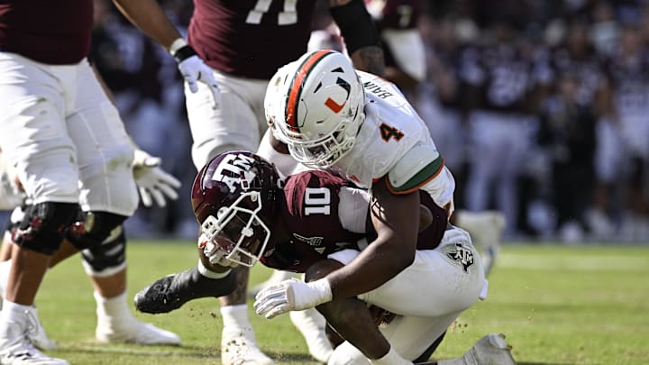 Bain (#4) sacked Texas A&M quarterback Marcel Reed three times in the Hurricanes' win. 