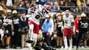 Nov 9, 2024; Nashville, Tennessee, USA;  South Carolina Gamecocks wide receiver Nyck Harbor (8) breaks the tackle of Vanderbilt Commodores linebacker Randon Fontenette (2) during the first half at FirstBank Stadium. Mandatory Credit: Steve Roberts-Imagn Images