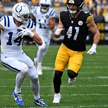 Nov 2, 2025; Pittsburgh, Pennsylvania, USA; Indianapolis Colts wide receiver Alec Pierce (14) catches a pass during the first half as Pittsburgh Steelers linebacker Payton Wilson (41) defends at Acrisure Stadium. Mandatory Credit: Barry Reeger-Imagn Images