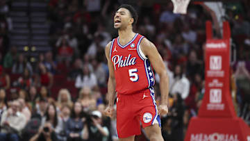 Mar 17, 2025; Houston, Texas, USA; Philadelphia 76ers guard Quentin Grimes (5) reacts after making a basket during overtime against the Houston Rockets at Toyota Center. Mandatory Credit: Troy Taormina-Imagn Images