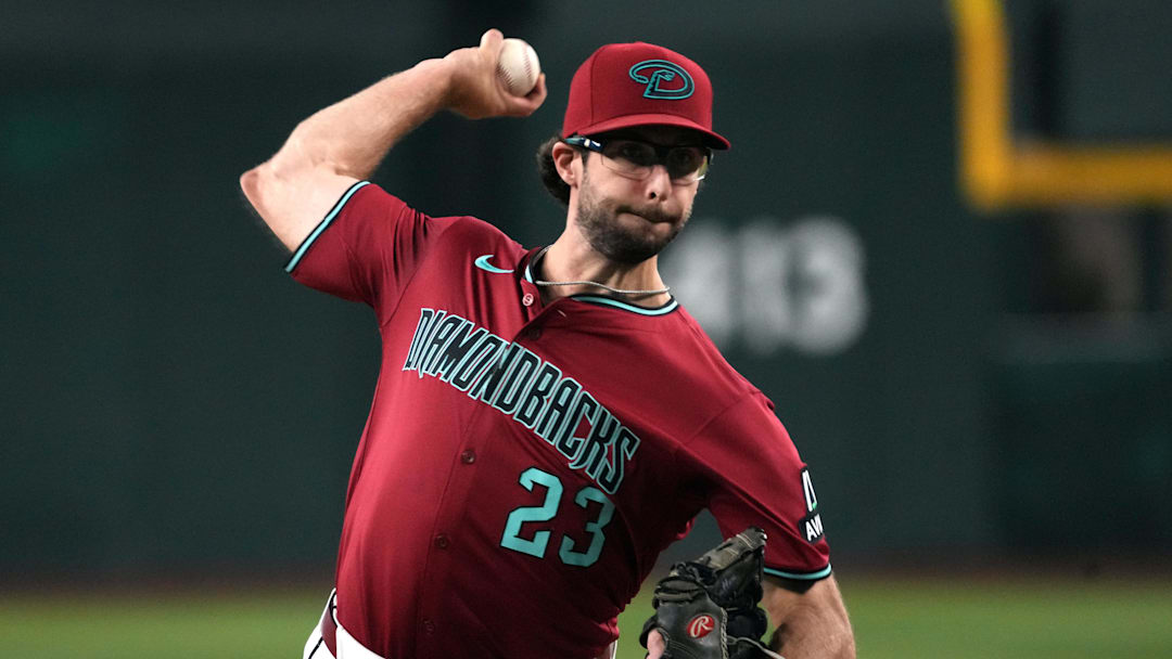 Sep 3, 2025; Phoenix, Arizona, USA; Arizona Diamondbacks pitcher Zac Gallen (23) throws against the Texas Rangers in the first inning at Chase Field. Mandatory Credit: Rick Scuteri-Imagn Images