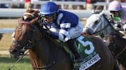 With Manny Franco aboard, Test Score rallied to a victory in Saturday's Grade 1 Belmont Derby at Saratoga.
