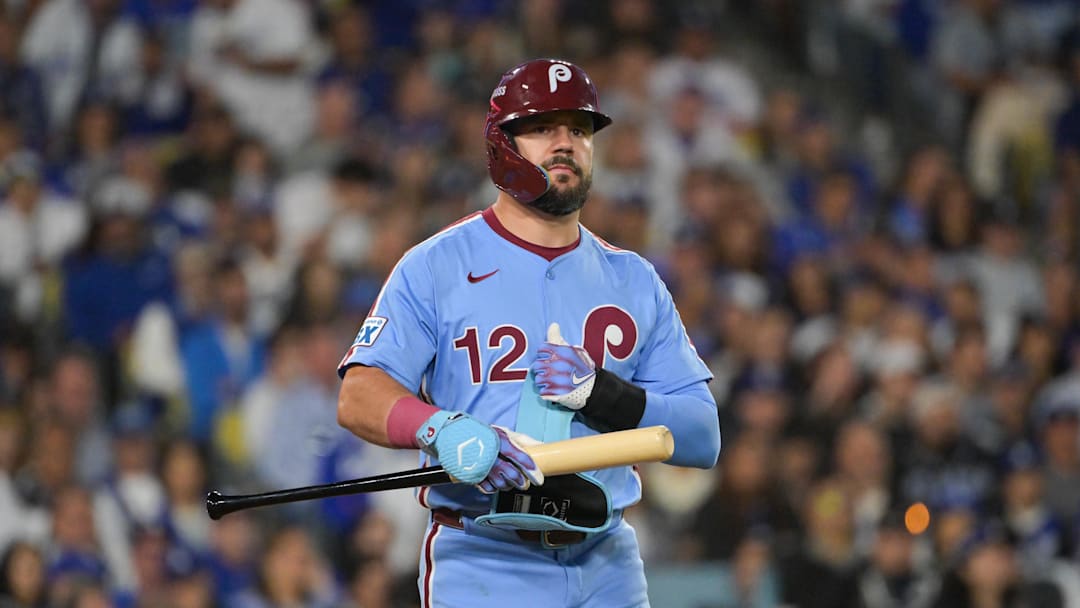 Oct 8, 2025; Los Angeles, California, USA; Philadelphia Phillies designated hitter Kyle Schwarber (12) looks on during the seventh inning against the Los Angeles Dodgers during game three of the NLDS round for the 2025 MLB playoffs at Dodger Stadium. Mandatory Credit: Jayne Kamin-Oncea-Imagn Images
