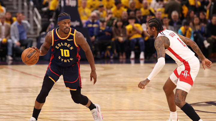 Apr 28, 2025; San Francisco, California, USA; Golden State Warriors forward Jimmy Butler III (10) controls the ball against Houston Rockets guard Jalen Green (4) during the second quarter of game four of the 2025 NBA Playoffs first round at Chase Center. Mandatory Credit: Kelley L Cox-Imagn Images Apr 28, 2025; San Francisco, California, USA; Golden State Warriors forward Jimmy Butler III (10) controls the ball against Houston Rockets guard Jalen Green (4) during the second quarter of game four of the 2025 NBA Playoffs first round at Chase Center. Mandatory Credit: Kelley L Cox-Imagn Images