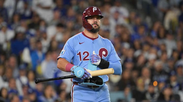 Oct 8, 2025; Los Angeles, California, USA; Philadelphia Phillies designated hitter Kyle Schwarber (12) looks on during the seventh inning against the Los Angeles Dodgers during game three of the NLDS round for the 2025 MLB playoffs at Dodger Stadium. Mandatory Credit: Jayne Kamin-Oncea-Imagn Images Oct 8, 2025; Los Angeles, California, USA; Philadelphia Phillies designated hitter Kyle Schwarber (12) looks on during the seventh inning against the Los Angeles Dodgers during game three of the NLDS round for the 2025 MLB playoffs at Dodger Stadium. Mandatory Credit: Jayne Kamin-Oncea-Imagn Images