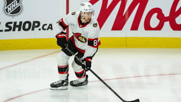 Jan 9, 2025; Ottawa, Ontario, CAN; Ottawa Senators defenseman Jake Sanderson (85) skates with the puck in the third period against the Buffalo Sabres at the Canadian Tire Centre. Mandatory Credit: Marc DesRosiers-Imagn Images