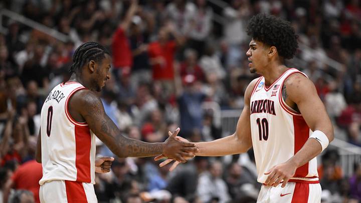 Mar 26, 2026; San Jose, CA, USA; Arizona Wildcats guard Jaden Bradley (0) high-fives Arizona Wildcats forward Koa Peat (10) against the Arkansas Razorbacks in the second half during a Sweet Sixteen game of the West Regional of the men's 2026 NCAA Tournament at SAP Center. Mandatory Credit: Eakin Howard-Imagn Images
