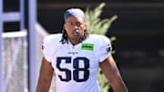 Jul 28, 2025; Foxborough, MA, USA; New England Patriots center Jared Wilson (58) heads to the practice fields for training camp at Gillette Stadium. Mandatory Credit: Eric Canha-Imagn Images