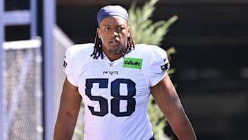 Jul 28, 2025; Foxborough, MA, USA; New England Patriots center Jared Wilson (58) heads to the practice fields for training camp at Gillette Stadium. Mandatory Credit: Eric Canha-Imagn Images