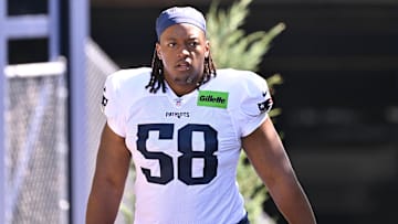 Jul 28, 2025; Foxborough, MA, USA; New England Patriots center Jared Wilson (58) heads to the practice fields for training camp at Gillette Stadium. Mandatory Credit: Eric Canha-Imagn Images