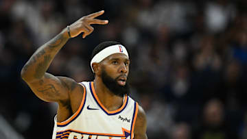 Phoenix Suns forward Royce O'Neale (00) celebrates a three point basket against the Golden State Warriors in the third quarter at Chase Center. Mandatory Credit: Eakin Howard-Imagn Images