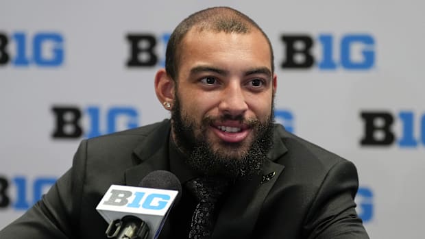 Purdue running back Devin Mockobee speaks to the media