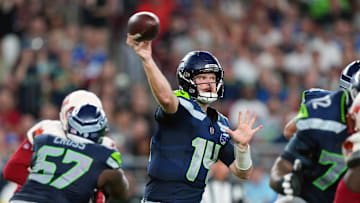 Sep 25, 2025; Glendale, Arizona, USA;  Seattle Seahawks quarterback Sam Darnold (14) throws a pass against the Arizona Cardinals in the third quarter at State Farm Stadium. Mandatory Credit: Joe Camporeale-Imagn Images