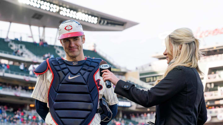 Minnesota Twins catcher Joe Mauer (7) gives an interview with FSN reporter Audra Martin after the game against Chicago White Sox at Target Field on 2018.