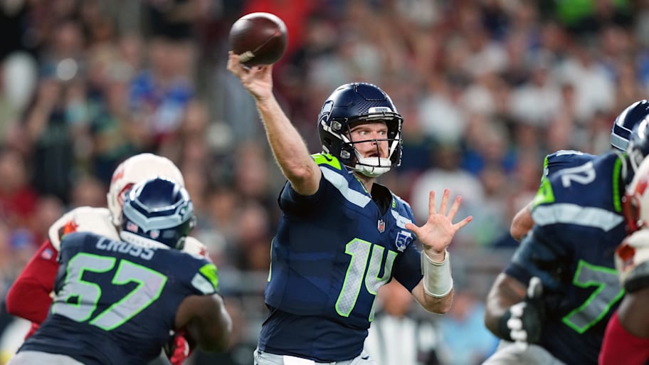 Sam Darnold throws a pass