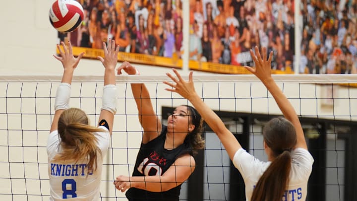 Divine Savior Holy Angels' Alyiana McMahon (10) taps one over during a match in the 39th annual Lynn LaPorte Memorial Sprawl girls volleyball tournament on Sept. 27 in West Bend, Wisc. Divine Savior Holy Angels won the tournament and remained at No. 9 in the High School on SI Top 25 Girls Volleyball National Rankings.