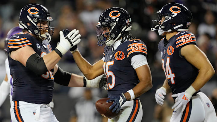Chicago Bears wide receiver Rome Odunze (center) celebrates with teammates after scoring a fourth-quarter touchdown in the Bears' Week 1 27-24 loss to the Vikings.