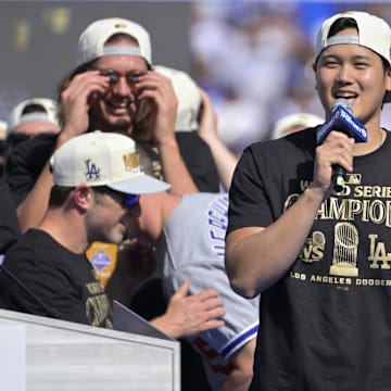 Nov 1, 2024; Los Angeles, CA, USA;  Los Angeles Dodgers designated hitter Shohei Ohtani (17) to speak to fans, in english, during the World Series Championship Celebration at Dodger Stadium. Mandatory Credit: Jayne Kamin-Oncea-Imagn Images