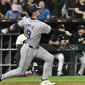 Jun 27, 2024; Chicago, Illinois, USA;  Colorado Rockies outfielder Brenton Doyle (9) hits a two-run home run against the Chicago White Sox during the sixth inning at Guaranteed Rate Field.