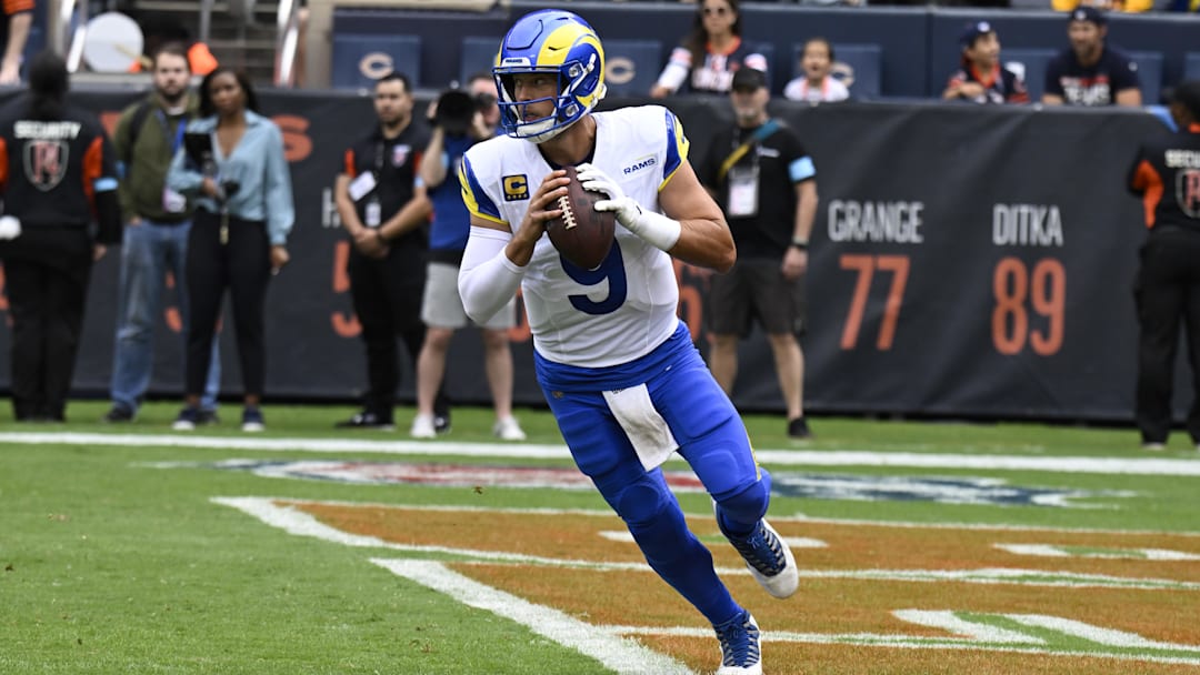 Sep 29, 2024; Chicago, Illinois, USA;  Los Angeles Rams quarterback Matthew Stafford (9)  looks to throw the ball against the Chicago Bears during the first half at Soldier Field. Mandatory Credit: Matt Marton-Imagn Images