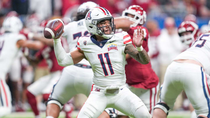 Dec 28, 2023; San Antonio, TX, USA;  Arizona Wildcats quarterback Noah Fifita (11) throws a pass in the first half against the Oklahoma Sooners at Alamodome.