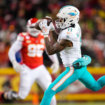 Miami Dolphins wide receiver Cedrick Wilson Jr. (11) catches a pass against the Kansas City Chiefs during the second half of a 2024 AFC wild card game at GEHA Field at Arrowhead Stadium.