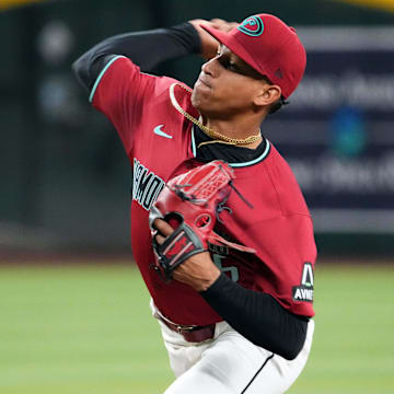 Jul 28, 2024; Phoenix, Arizona, USA; Arizona Diamondbacks pitcher Yilber Diaz (45) pitches against the Pittsburgh Pirates during the first inning at Chase Field. Mandatory Credit: Joe Camporeale-Imagn Images