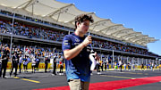 Oct 20, 2024; Austin, Texas, USA; Williams Racing driver Franco Colapinto (43) of Team Argentina walks back to the paddock after the driver’s parade before the 2024 Formula One US Grand Prix at Circuit of the Americas. Mandatory Credit: Jerome Miron-Imagn Images