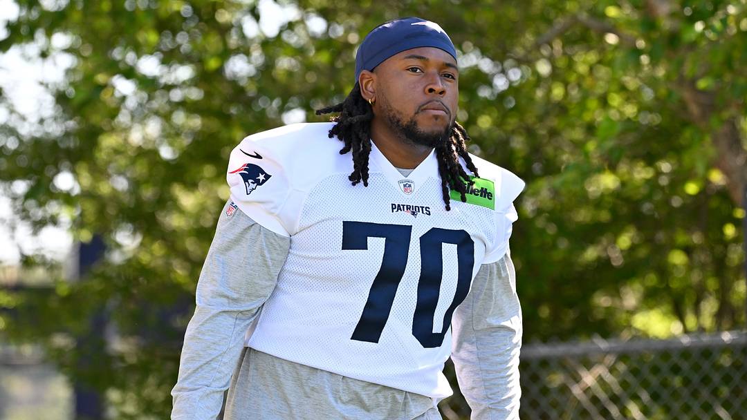 Jul 23, 2025; Foxborough, MA, USA; New England Patriots offensive tackle Caedan Wallace (70) walks to the practice field for training camp at Gillette Stadium. Mandatory Credit: Eric Canha-Imagn Images Jul 23, 2025; Foxborough, MA, USA; New England Patriots offensive tackle Caedan Wallace (70) walks to the practice field for training camp at Gillette Stadium. Mandatory Credit: Eric Canha-Imagn Images