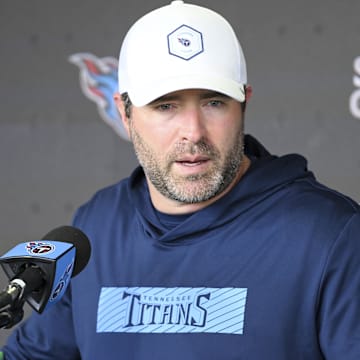 Tennessee Titans head coach Brian Callahan talks with reporters just prior to the start of rookie training camp. Mandatory Credit: Steve Roberts-Imagn Images
