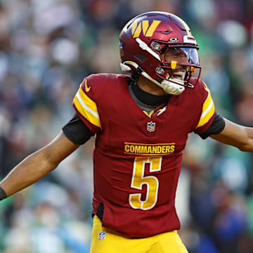 Daniels celebrates after throwing a touchdown against the Eagles in the Commanders’ 10th win of the year.