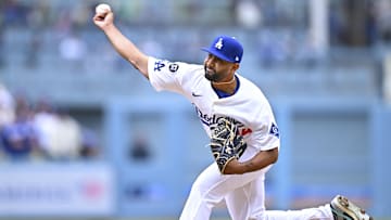 Apr 27, 2025; Los Angeles, California, USA; Los Angeles Dodgers pitcher Yoendrys Gomez (94) throws a pitch against the Pittsburgh Pirates during the ninth inning at Dodger Stadium. Mandatory Credit: Jonathan Hui-Imagn Images