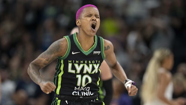 Minnesota Lynx guard Courtney Williams celebrates
