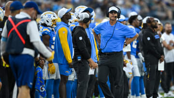 Aug 10, 2024; Inglewood, California, USA; Los Angeles Chargers head coach Jim Harbaugh on the sidelines against the Seattle Seahawks during the fourth quarter at SoFi Stadium.