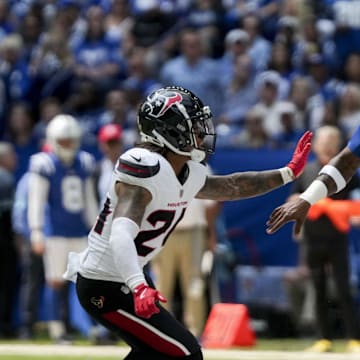 Houston Texans cornerback Derek Stingley Jr. (24) chases after Indianapolis Colts quarterback Anthony Richardson (5) at Lucas Oil Stadium.