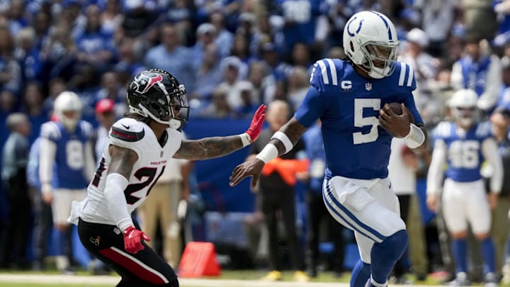 Houston Texans cornerback Derek Stingley Jr. (24) chases after Indianapolis Colts quarterback Anthony Richardson (5) at Lucas Oil Stadium.