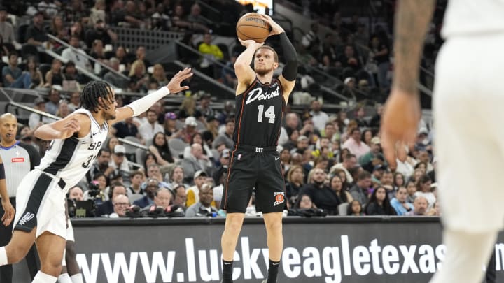 Apr 14, 2024; San Antonio, Texas, USA; Detroit Pistons guard Malachi Flynn (14) shoots during the first half against the San Antonio Spurs at Frost Bank Center. Mandatory Credit: Scott Wachter-USA TODAY Sports