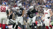 November 5, 2023; Paradise, Nevada, USA; Las Vegas Raiders defensive end Maxx Crosby (98) and defensive tackle Adam Butler (69) celebrate after sacking New York Giants quarterback Tommy DeVito (15) during the third quarter at Allegiant Stadium. Mandatory Credit: Kyle Terada-USA TODAY Sports