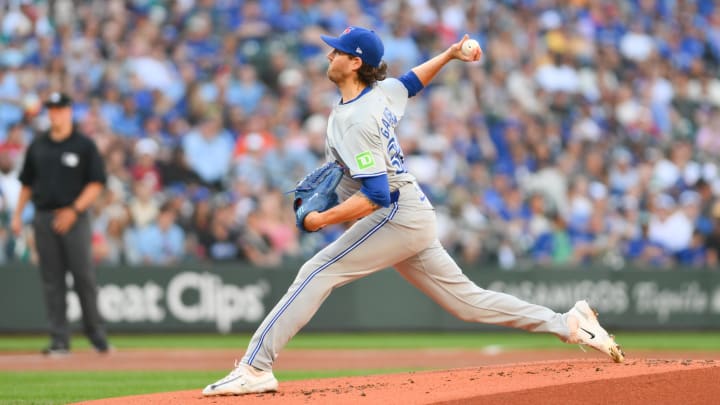 Jul 5, 2024; Seattle, Washington, USA; Toronto Blue Jays starting pitcher Kevin Gausman (34) pitches to the Seattle Mariners during the first inning at T-Mobile Park. Mandatory Credit: Steven Bisig-USA TODAY Sports