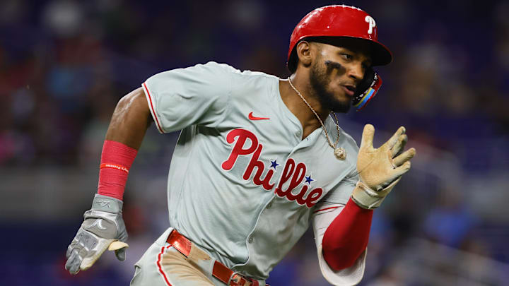 Sep 6, 2024; Miami, Florida, USA; Philadelphia Phillies center fielder Johan Rojas (18) runs toward second base after hitting an RBI double against the Miami Marlins during the fifth inning at loanDepot Park