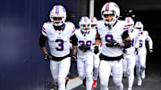 Jan 5, 2025; Foxborough, Massachusetts, USA; Buffalo Bills safety Damar Hamlin (3) and safety Taylor Rapp (9) run onto the field before a game against the New England Patriots at Gillette Stadium. Mandatory Credit: Brian Fluharty-Imagn Images