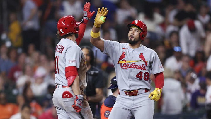 Apr 17, 2026; Houston, Texas, USA; St. Louis Cardinals designated hitter Ivan Herrera (48) celebrates with first baseman Alec Burleson (41) after hitting a hoome run during the eighth inning against the Houston Astros at Daikin Park. Mandatory Credit: Troy Taormina-Imagn Images