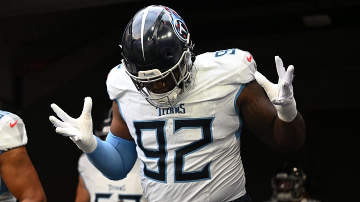 Aug 19, 2023; Minneapolis, Minnesota, USA; Tennessee Titans defensive end Jayden Peevy (92) enters the field before the game against the Minnesota Vikings at U.S. Bank Stadium. Mandatory Credit: Jeffrey Becker-USA TODAY Sports