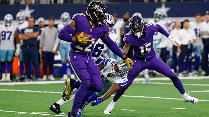 Baltimore Ravens running back Derrick Henry stiff arms Dallas Cowboys cornerback Jourdan Lewis. Baltimore Ravens running back Derrick Henry stiff arms Dallas Cowboys cornerback Jourdan Lewis.