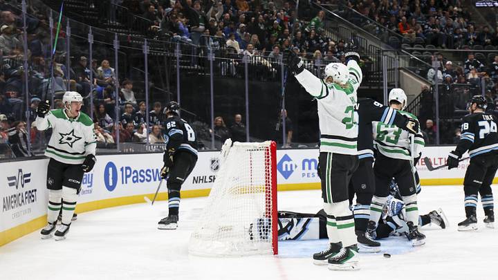 Jan 15, 2026; Salt Lake City, Utah, USA; The Dallas Stars celebrate a goal against the Utah Mammoth by right wing Mikko Rantanen, left, during the third period at Delta Center. Mandatory Credit: Rob Gray-Imagn Images